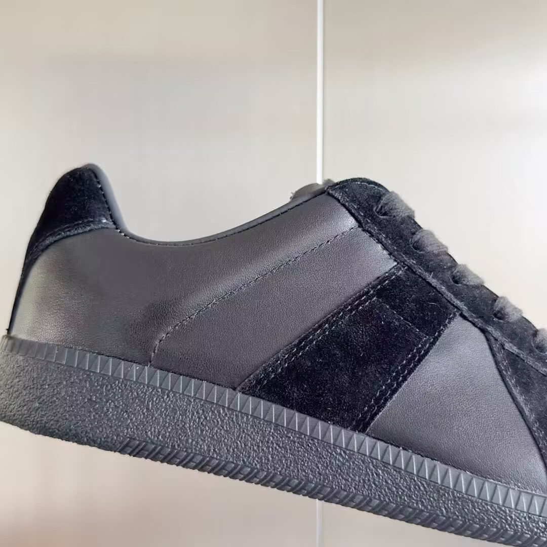 ua ma*s*n Ma*i*la mm6 sneakers